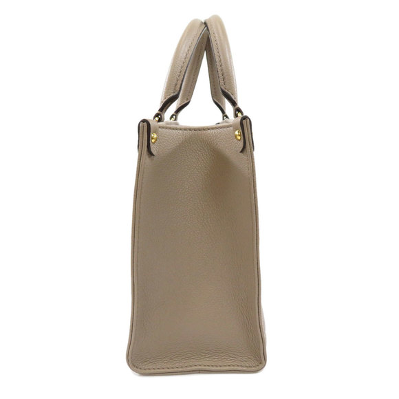 Louis Vuitton On the Go PM Bicolor Tourtrail Crème Handbag Empreinte - Picture 3 of 10